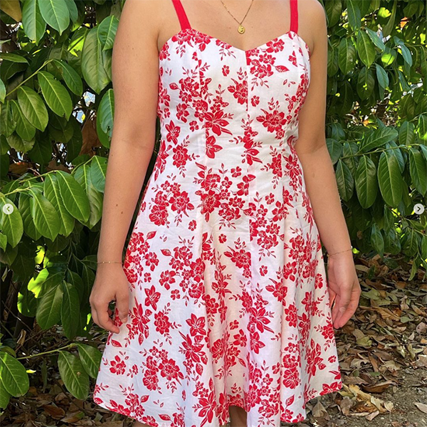Sirius summer dress sewing pattern in a red on white printed fabric