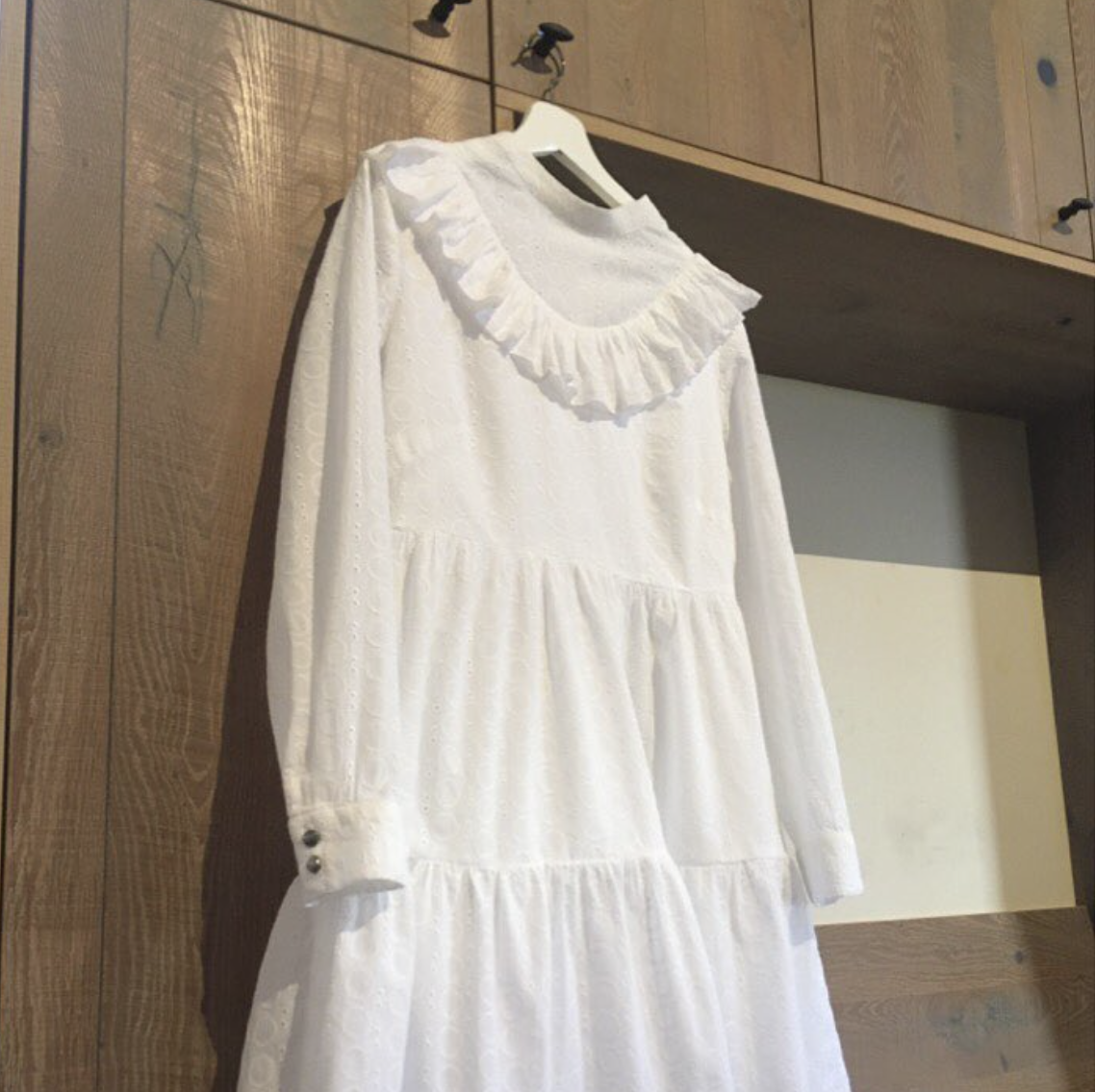 The Leo babydoll dress pattern is shown here in a white coton lawn that showcases the babydoll cut