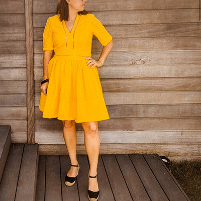 Aquarius summer dress sewing pattern in a yellow eyelet cotton fabric
